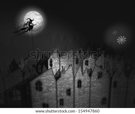 A model of skyline of expressionist-style newspaper houses. Dangling glitter stars and paper moon. a witch puppet flies over in silhouette. Shallow depth of field and shadows for spooky atmosphere.