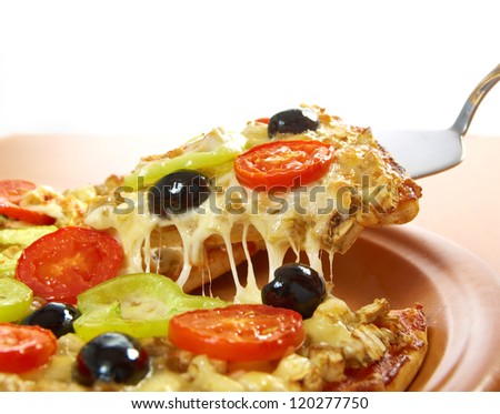 .home pizza with tomato and eggplant  Closeup .taking slice of pizza,melted cheese dripping. isolated on white background.