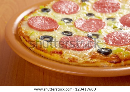 home pizza  Pepperoni.Closeup