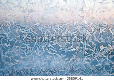 Ice on window,winter icy patterns,icy drawings