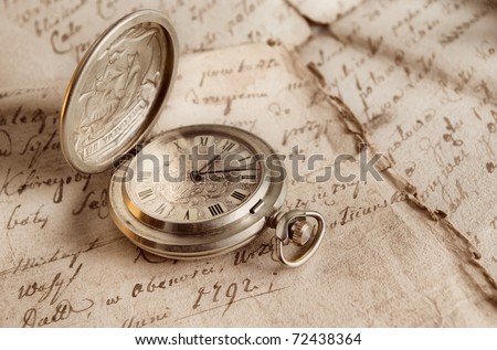 old watch,old-time documents,past and future