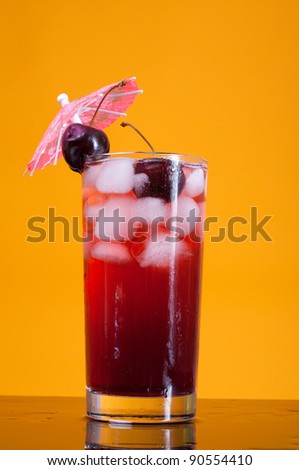 cocktail  with cherry closeup isolated white background.