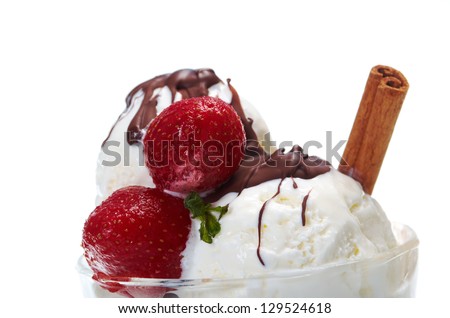 ice cream  with chocolate sauce and strawberries,cinnamon. closeup.isolated on white background.