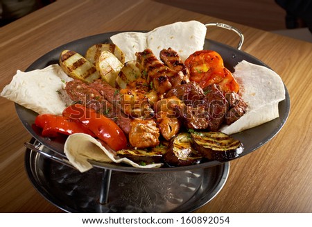 Shashlik (shish kebab). Various types  mat roasted with vegetable closeup
