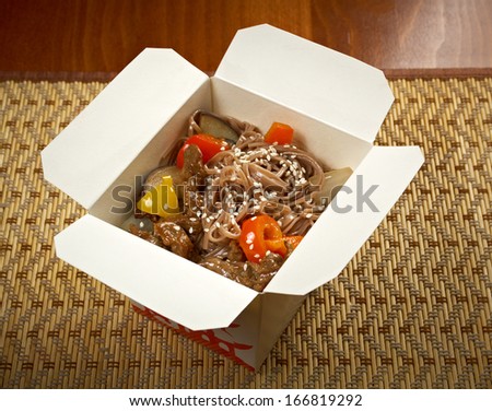 take-out food -Noodles with pork and vegetables in take-out box