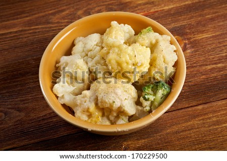 Vegetable Cauliflower  gratin .casserole on a rustic table