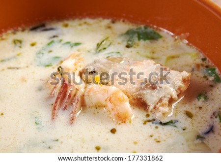 Seafood Chowder - Fish Soup with Salmon, Cream and Potatoes .country cuisine.farm-style