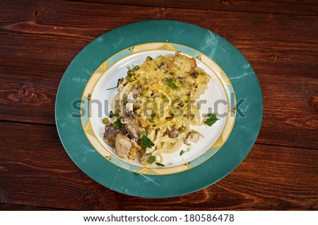 Tetrazzini is an American dish.Spaghetti with chicken, mushrooms and fresh grated parmesan cheese.