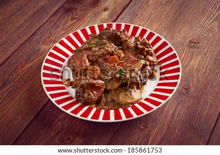 Beef bourguigno - dish originates from Burgundy region (in French, Bourgogne) ?stew prepared with beef braised in red wine.farm-style