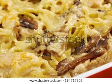 Tetrazzini is an American dish.Spaghetti with chicken, mushrooms and fresh grated parmesan cheese. baked noodle casserole
