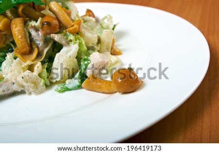 Fresh green salad with mushrooms,closeup
