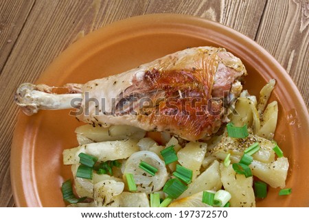Turkey leg with baked  potatoes .country cuisine