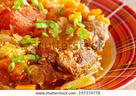 Ossobuco - Italiano country cuisine .Milanese specialty of cross-cut veal shanks braised with vegetables