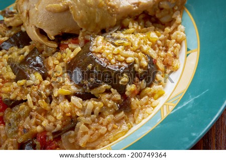Maqluba  is a traditional dish of the Arab Levant, Persia, and Palestine.dish includes meat, rice, and fried vegetables placed in a pot, which is then flipped upside down