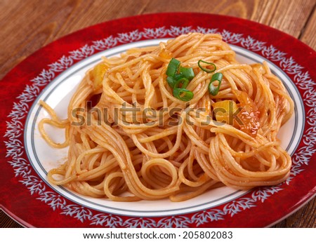 Pasta asciutta -   pastasciutta cooked pasta is plated and served with a complementary sauce or condiment