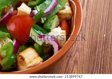 Panzanella or panmolle is a Tuscan salad of bread and tomatoes