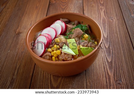 Pozole - traditional soup Mexico.broth rich soup made with pork, red chiles, radishes, cilantro