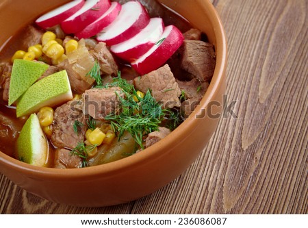 Pozole Poxo - traditional soup Mexico.broth rich soup made with pork, red chiles, radishes, cilantro