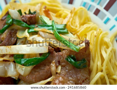 Shanghai Noodles - style fried noodles with meats and mixed vegetables
