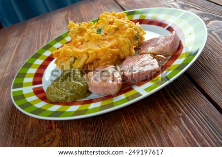 Rotmos med flask - mashed potatoes, turnip and roast ham.Swedish cuisine