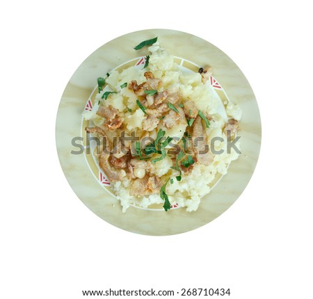 Hete bliksem stamppot  - traditional German dish most popular in the regions of the Rhineland, Westphalia and Lower Saxony consists of  fried onions, and mashed potato with apple sauce.