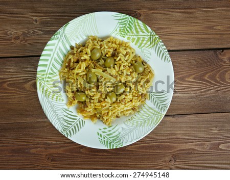 Arroz con gandules -  rice, pigeon peas . cooked  pot with Puerto Rican-style. popular throughout Latin America and the Caribbean.