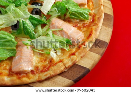 Pizza Atlantic salmon . italian kitchen. Studio