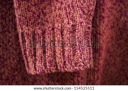 red wool Knitting sweater sleeve