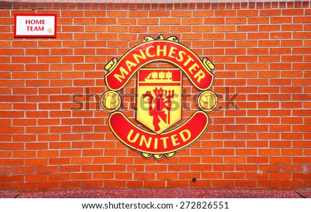 MANCHESTER, ENGLAND - FEBRUARY 17, 2014:\
Logo on the home team player zone in the Old Trafford stadium on February 17 ,2014 in Manchester, England. Old Trafford stadium is home to Manchester United.