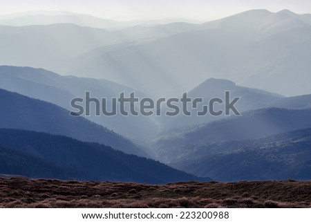 The sun's rays in the mountains at noon. Eastern Carpathians