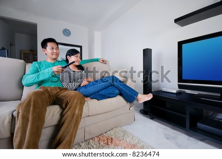 Couple watching movies together