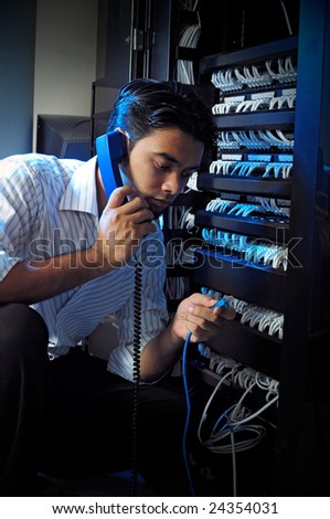 System administrator talking on the phone