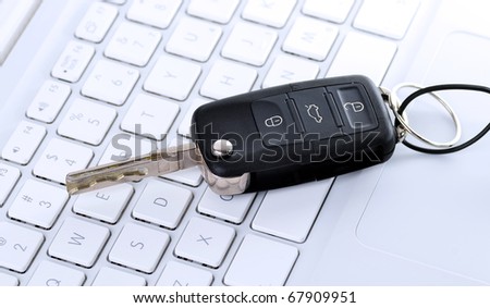 Picture of car key on keyboard