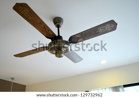 Picture Of Wooden Ceiling Fan Inside The Living Room