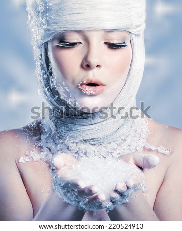 Beautiful woman with bright makeup. Fantasy girl portrait. Winter fairy portrait. Long hair. Beautiful snow queen