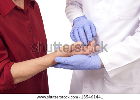 Senior woman with rheumatoid arthritis visit a doctor Isolated on white