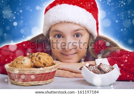 Happy Christmas girl wants to eat cookie