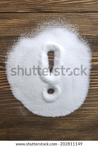 Exclamation mark written on a heap of salt - anti hypertension campaign