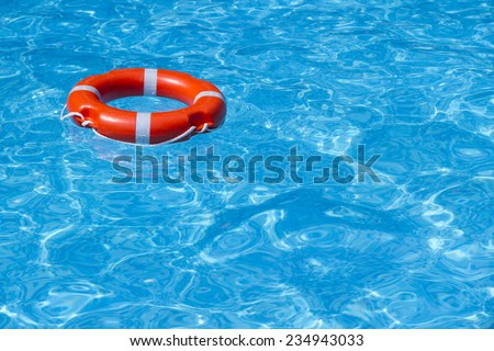 A buoy on the water in the pool is located in the upper left corner A lifeline in the pool 1