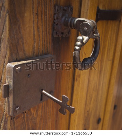 vintage door lock, key and handle from the church mission door
