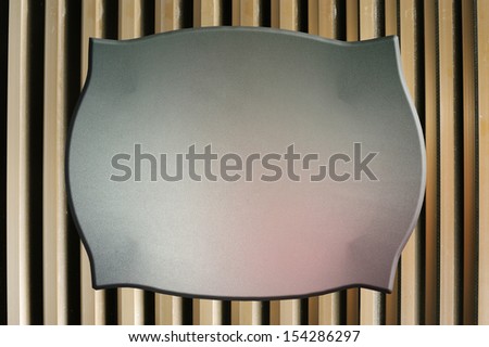grain texture label on steel louver background