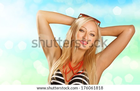 Cute bikini woman on the seaside. Shining water background.