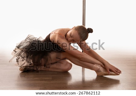 beautiful ballet dancer in the pole dance hall
