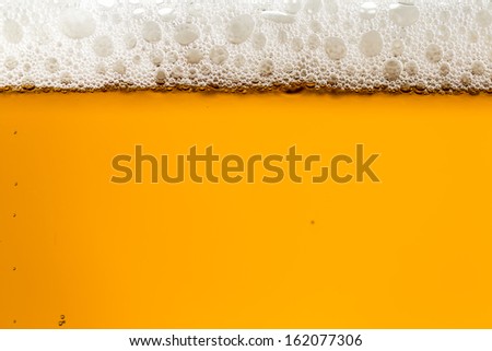 Tap Czech beer with beutiful white foam in the glass