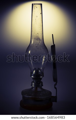 old kerosene lamp with mirror isolated on white background - retro