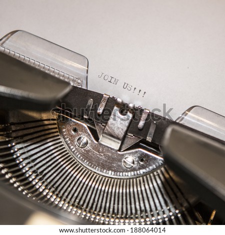 Typewriter closeup shot, concept of join us