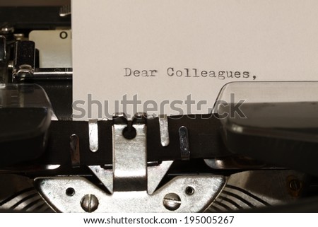 Letter with a title Dear Colleagues typed on old typewriter