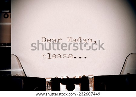 Letter with a title Dear Madam typed on old typewriter