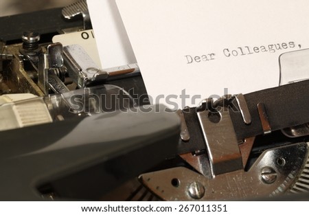 Letter with a title Dear Colleagues typed on old typewriter