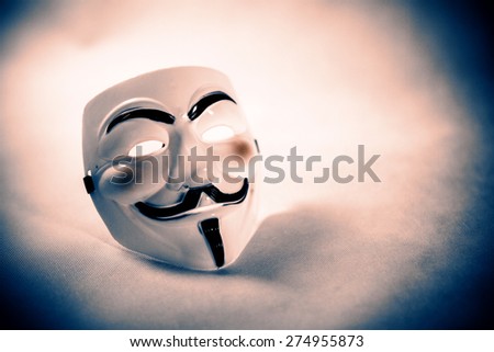 white anonymous mask on white background